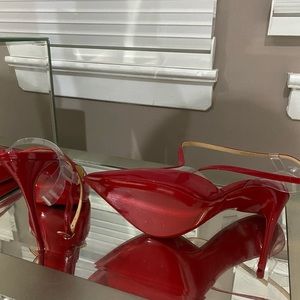 Red Louboutin heels